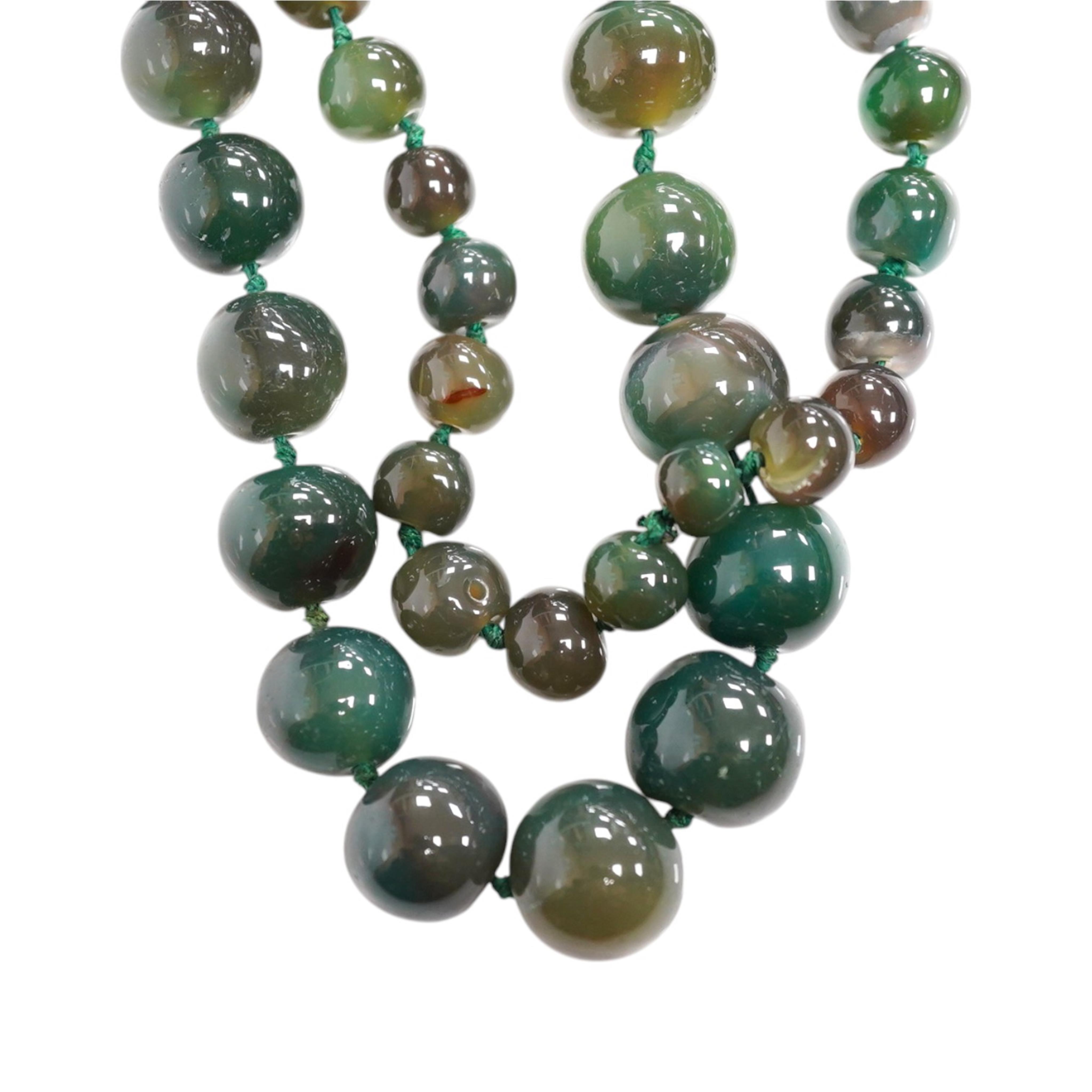 An early 20th century hardstone beaded necklace. Condition - fair